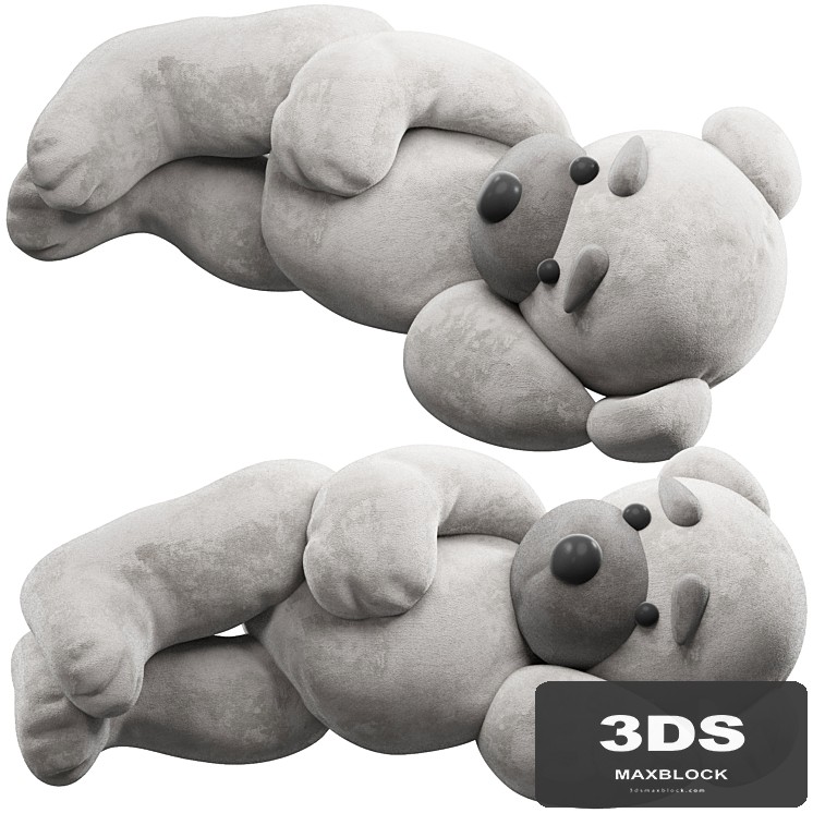 soft toy bear lies on its side